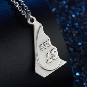 Silver stainless steel necklace with a map-shaped pendant featuring ST and SON engraving