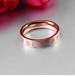 Detail of rose gold couples ring with matte finish and engraved Chinese characters