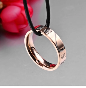 Rose gold couple ring pendant on leather cord featuring Chinese character engraving