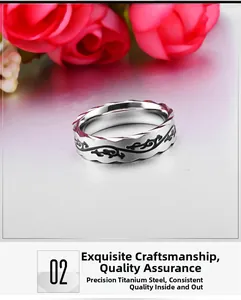 Detailed macro view of silver titanium steel ring with black vine pattern engraving