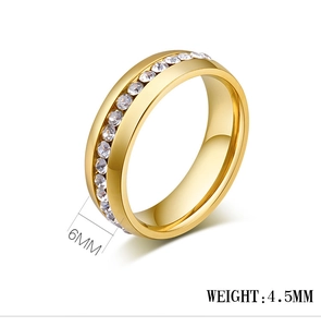 Detail shot of 6mm gold plated stainless steel ring with channel set cubic zirconia