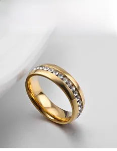 Detailed close-up of 18K gold plated ring with continuous white zircon stones