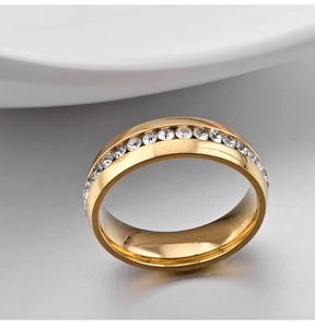 Close-up of 18K gold plated stainless steel ring with paved white zircon crystals