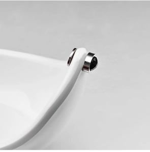 Close-up of minimalist black crystal magnetic stud earring on a white ceramic surface