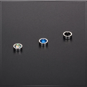 Detailed view of silver magnetic stud earrings with colorful, blue and black crystals