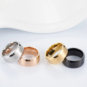 Detailed group view of four brushed stainless steel rings in silver, rose gold, gold and black
