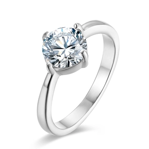 Elegant polished silver ring featuring a sparkling round zircon in a classic four-prong setting