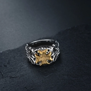 Vintage stainless steel cross ring with gold-tone relief and engraved side patterns
