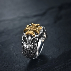 Vintage stainless steel ring featuring a golden iron cross and embossed fleur-de-lis