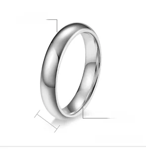 Detail view of a 4mm high polished tungsten steel ring showing its shiny curved surface