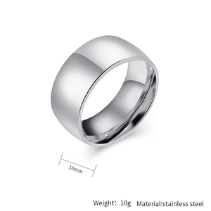 Macro detail of 10mm wide silver stainless steel ring showing polished surface and weight