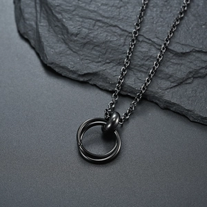 Minimalist black stainless steel double ring necklace with a vintage industrial pendant