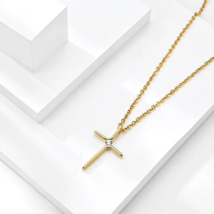 Elegant gold cross necklace for women featuring a centered sparkling clear crystal pendant
