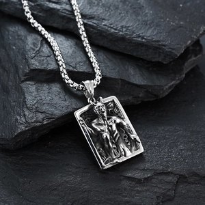 Gothic vintage silver demon square pendant with box chain on dark slate stone