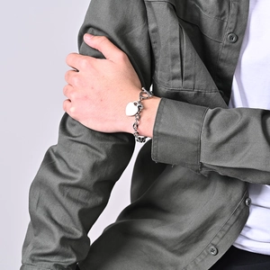 Detailed view of silver heart pendant bracelet with OT toggle clasp and chunky chain link
