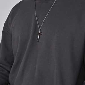 Collier bouteille d'huile zodiaque lumineux avec pendentif argent et détail rouge