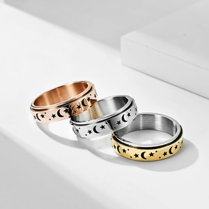 Rotating stainless steel star and moon spinner rings in gold, silver, and rose gold