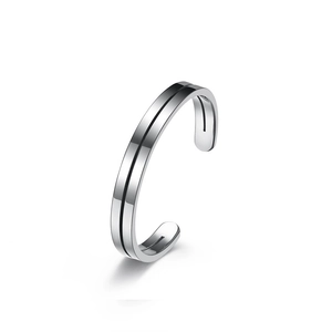 Minimalist silver stainless steel cuff bracelet featuring a sleek black center line design
