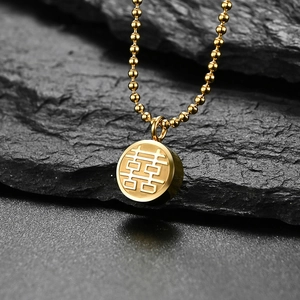 18K gold plated stainless steel necklace with round double-sided Xi pendant