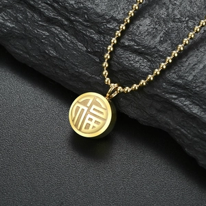 18K gold plated stainless steel necklace with double-sided Fu pendant on black rock