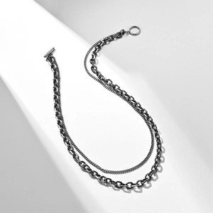 Detailed view of vintage silver double-layer chain necklace with T-bar toggle clasp