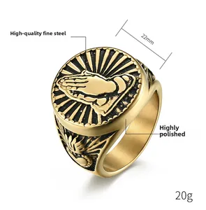 Macro detail of 18K gold plated praying hands ring with 22mm diameter and 20g weight