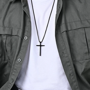 Unisex black stainless steel cross necklace with a minimalist matte finish pendant