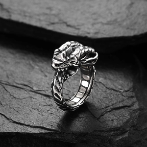 Close-up of vintage gothic stainless steel dragon claw ring with oxidized silver finish