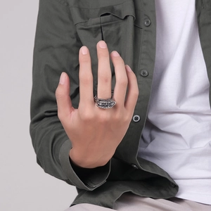 Retro punk stainless steel dragon claw ring with vintage silver finish on finger