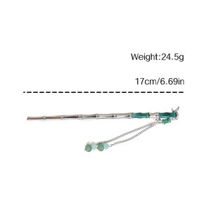 Elegant bamboo style hair pin in silver with green jade beads and hanging metal tassels