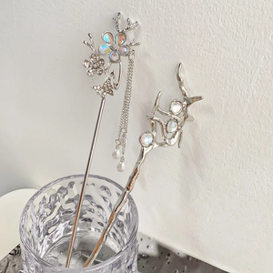 Elegant silver moonstone hair stick with butterfly flower tassel and branch design