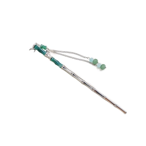 Elegant bamboo-shaped silver hair pin with green jade-like accents and colorful tassels