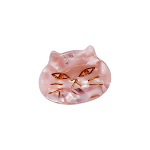 Pink marble pattern cat hair claw clip made of acetate with gold metal accents