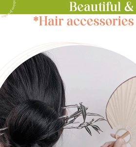 Close-up of silver bamboo leaf hair stick with traditional Chinese style aesthetic