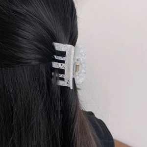 Elegant marble pattern acetate hair claw clip for women holding black long hair