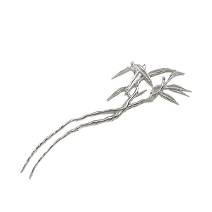 Chinese style silver bamboo leaf hair pin with detailed metallic texture on white back