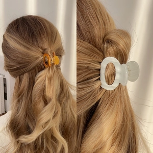 Elegant tortoiseshell and marble acetate hair claws for high ponytail and half-up hairstyles