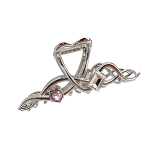 Elegant silver metal shark hair claw with zircon heart crystals and hollow line design