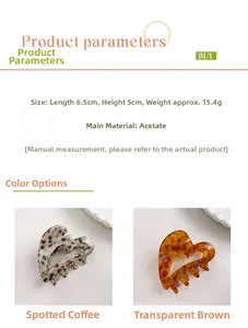Detail of acetate heart claw clips measuring 6.5x5cm in leopard and amber patterns