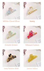 Assorted cellulose acetate hair claws showing marble, tortoiseshell, and colorful patterns