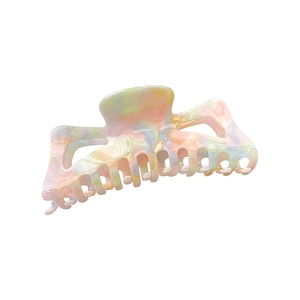 Pince à cheveux géante en acétate avec motif marbré coloré et design évidé élégant