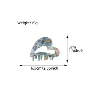 Elegant heart-shaped acetate hair claw clip with colorful marble pattern and dimensions