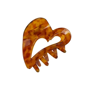 Elegant amber tortoiseshell hollow heart-shaped acetate claw clip for hair styling