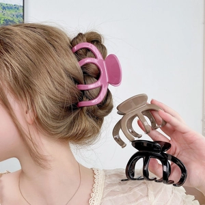 Three-piece pumpkin shark hair claw clips in purple, brown and black for thick hair