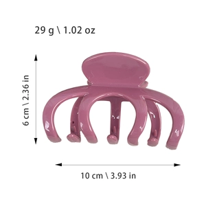 Purple glossy pumpkin hair claw clip showing 10cm width and 29g weight dimensions