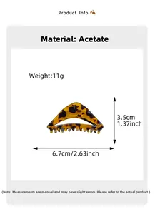 Detail view of acetate geometric hair claw with tortoiseshell pattern and 6.7cm dimensions