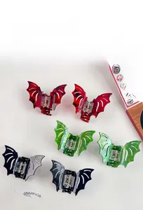 Detailed set of Gothic bat hair claws in red, green, and black acetate materials