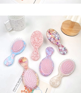 Mini brosses de massage à coussin d'air en acétate avec six motifs marbrés colorés