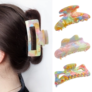 Colorful acetate hair claws set with artistic oil painting textures for elegant styling