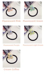 Detail showing bear hair ties with aurora heart crystals in five vibrant colors